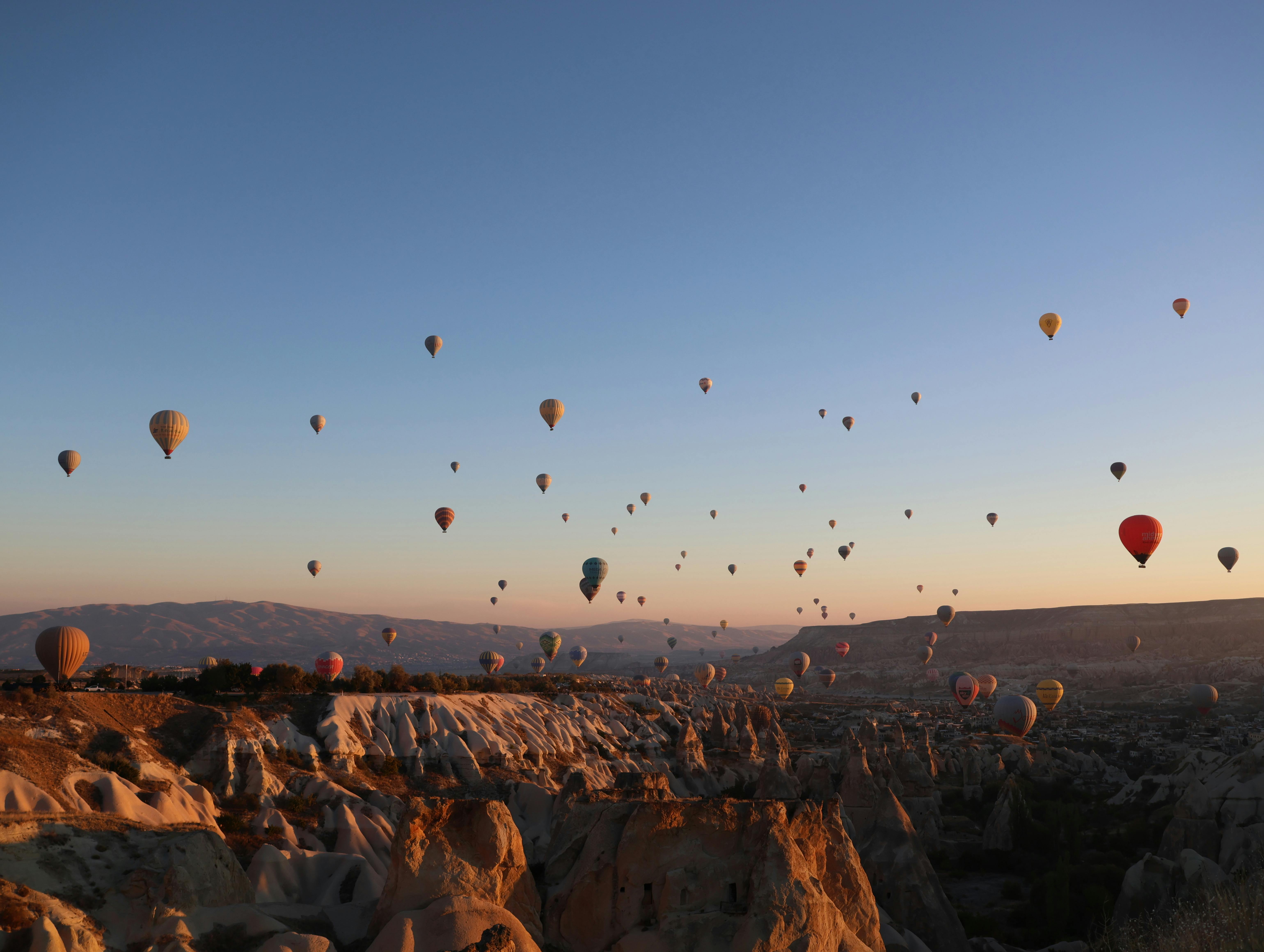 Hot air balloons over Cappadocia at sunrise